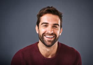 man smiling with Veneers 